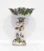 German porcelain centrepiece by Schierholz Plaue, the base and stem modelled with children amid