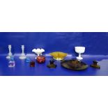Pair of pressed glass candlesticks of faceted baluster form, an amber moulded glass hors d'oeuvres