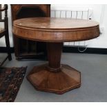 Circular walnut centre table on faceted pedestal base, 77cm  62 cms in height  Please see images for