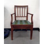 19th century mahogany bar-back carver chair on square section tapering supports