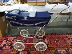 Silver Cross folding doll's pram with blue cover, circa 1960's/70's