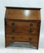 Early 20th century oak bureau with fitted interior above three drawers, 91cm