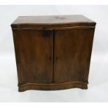 20th century walnut serpentine-fronted two-door cupboard enclosing drawers