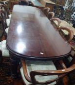 20th century mahogany dining table with moulded edge, raised upon turned and carved supports, 273cm