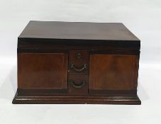 Edwardian inlaid mahogany canteen cabinet, the rising cover revealing a fitted compartment over