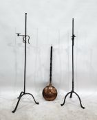 Pair of wrought iron adjustable floor lights with tripod bases and a copper warming pan (3)