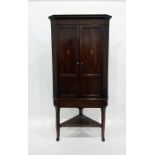 Georgian inlaid mahogany corner cabinet on later stand with cavetto cornice, plain cross-banded