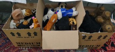 Three boxes of assorted teddy bears to include a Steiff bear head pin, a Sooty hand puppet, etc