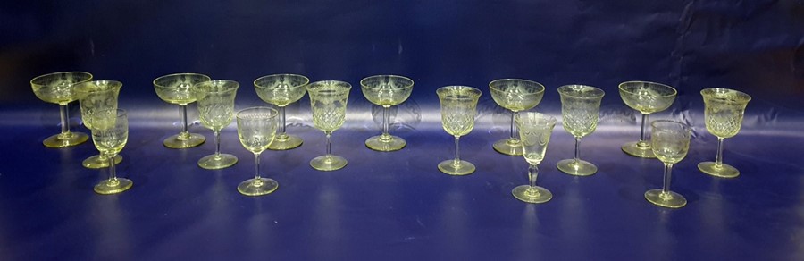 Set of six champagne saucers with etched decoration, a set of six wine glasses with floral etched