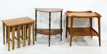 20th century teak nest of coffee tables, a two-tier demi-lune side table with foliate decoration and