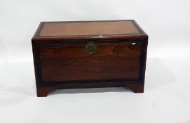 Mid 20th century Chinese camphorwood lined chest with foliate carving to the front and top, 90.5cm