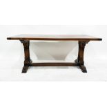 Rectangular oak plank top coffee table with cleated end supports, on trestle-style base, 121.5cm