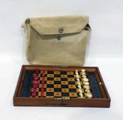 Travelling chess set by Jaques of London, with natural and stained, turned ivory pieces, in mahogany