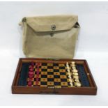 Travelling chess set by Jaques of London, with natural and stained, turned ivory pieces, in mahogany