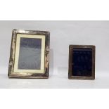 Modern silver plated mounted photograph frame of plain rectangular design, 22cm x 17cm and another