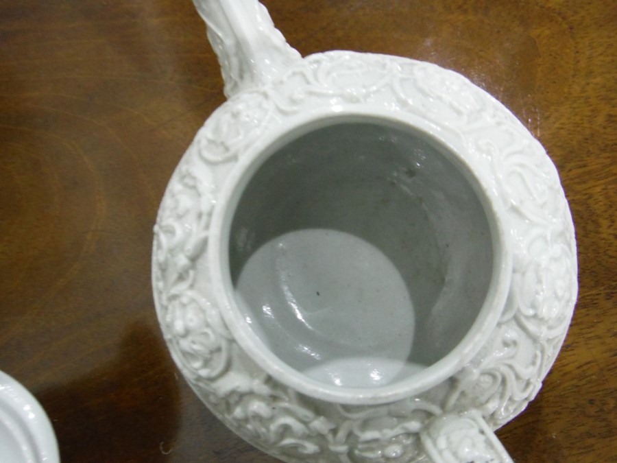 Early 19th century Wedgwood teapot, the grey glazed body with raised scrolling decoration and with - Image 10 of 10