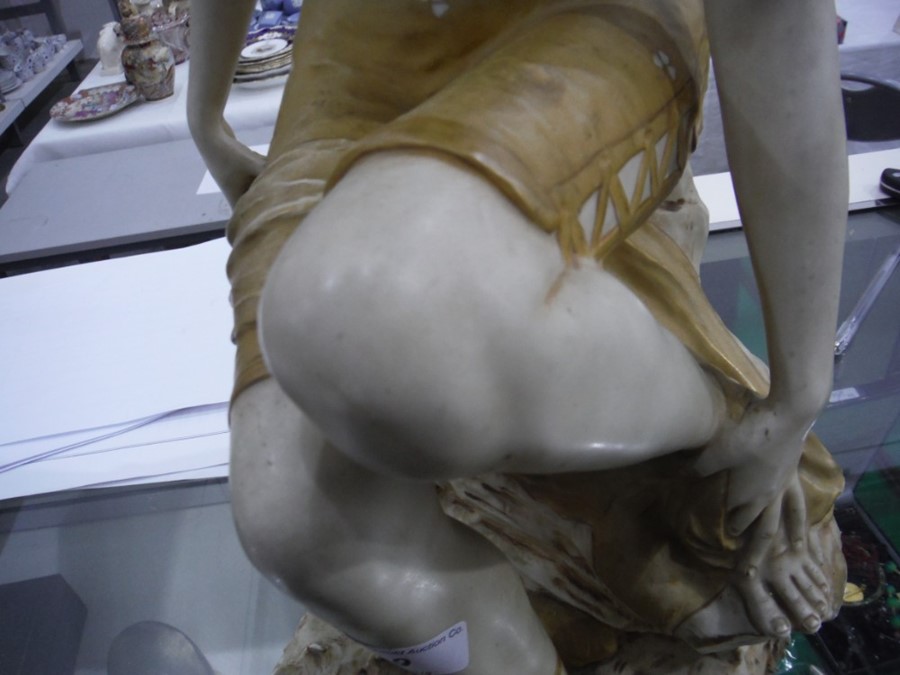 Royal Dux porcelain figure of a girl in bathing suit, seated on a rock and drying her feet, all on - Image 4 of 9