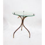Gilt metal and glass tripod occasional table, circular with foliate decoration Damaged