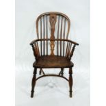 Antique country yew and elm Windsor style armchair on turned supports with crinoline stretcher