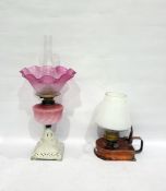 Copper carrying oil lamp with brass fitting and another oil lamp with pink frill rim shade, opaque