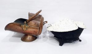 A copper helmet shaped coal scuttle and a cast iron acanthus leaf coal scuttle (2)