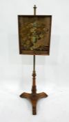 Victorian brass and maple polescreen, having brass pole on carved leaf maple concave triangular base