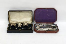 Silver condiment set, Birmingham 1936, comprising salt, pepperette, mustard and two spoons, each