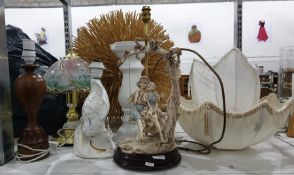 Three lamps together with white ceramic pedestal, figure of boy and girl on swing, etc