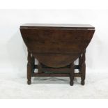 Antique oak small gateleg dining table with oval top and baluster turned uprights, 128cm wide
