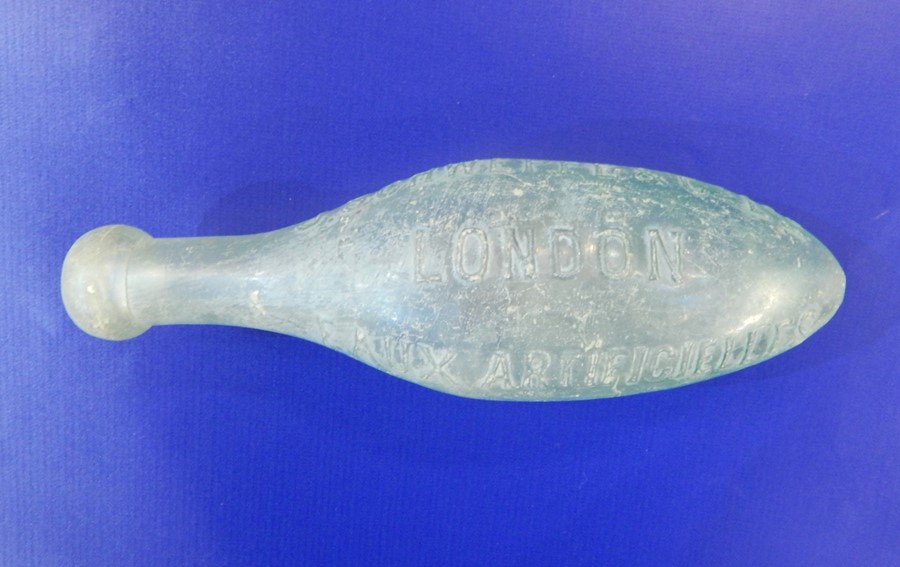 French dolphin Hamilton bottle marked 'J Schweppe & Co', with moulded dolphins, London Eau