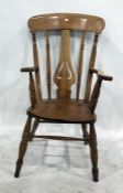 Beech and elm carver chair with pierced vase-shaped back splat, the whole raised upon turned front