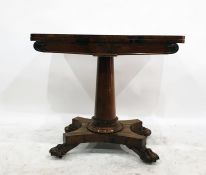 Regency rosewood folding card table on tapered cylindrical column and concave-sided quadruped base