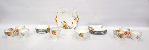 Shelley tea set decorated with orange blossoms on a white ground with gilt rims, comprising cake