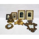 Quantity of early family photographs in gilt moulded frames, further gilt moulded wood shelf,