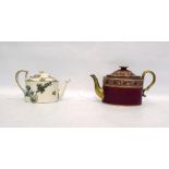 19th century porcelain teapot of oval form, the red body decorated with a gilt floral band and a