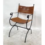 Wrought iron and brown hide open armchair