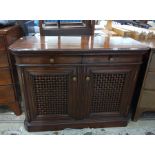 Continental fruitwood(?) dwarf cupboard fitted two oak lined frieze drawers over two lattice woven