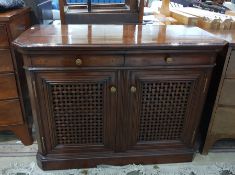 Continental fruitwood(?) dwarf cupboard fitted two oak lined frieze drawers over two lattice woven