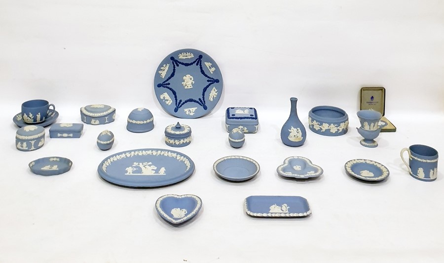 Large quantity of Wedgwood blue jasperware including boxes, cup and saucer, pin dishes, vase, plates