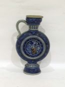 German salt glazed stoneware ewer by Peter Simon Gerz, of circular form with central armorial