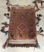 Eastern wool saddle rug with tasselled edges