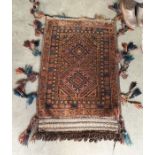 Eastern wool saddle rug with tasselled edges