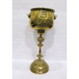 Brass jardiniere and stand embossed with armorial bearings on a stepped base