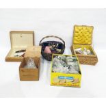 Quantity of sewing equipment to include buttons, decorative old pincushions, fitted sewing basket
