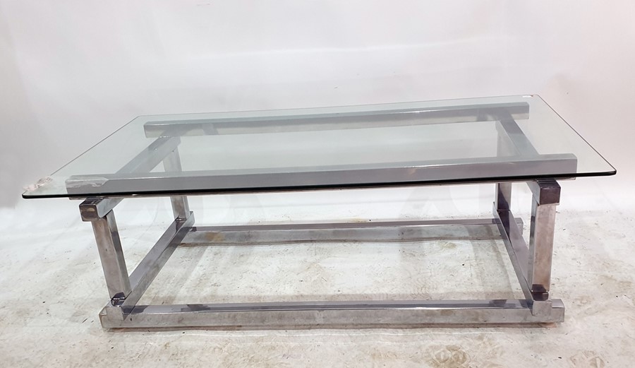 Rectangular glass-topped coffee table on a chromium base, 120cm  measurements are 120 cms wide -, 40