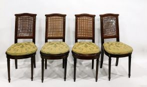 Set of six French style mahogany and kingwood inlaid, caned back dining chairs, having cross-