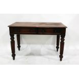 19th century mahogany two drawer desk on turned and reeded supports, 104.5cm