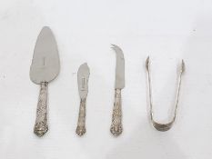 Silver-handled Queens pattern cake slice, a fish knife, a cheese knife and a pair of Kings pattern