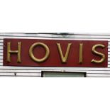 Large Hovis metal advertising sign, the letter highlighted in gold on an orange ground, 160cm long