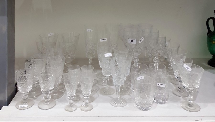 Quantity of cut glass drinking glasses including a set of six wine glasses, a set of six sherry